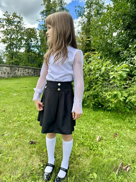 Black skirt with decorative buttons